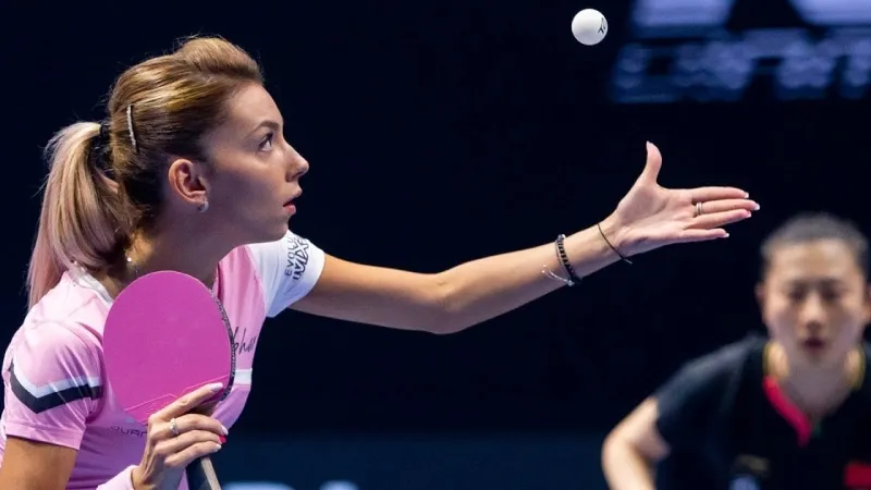 A picture of the Bernadette Szocs and her Pink Racket