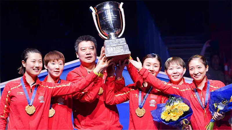 Chinese Womens Team and their Coach