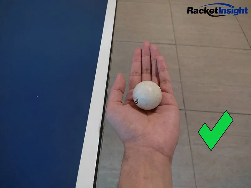 Hold the ball in your palm