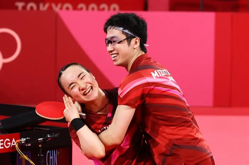 A picture of table tennis players Ito and Mizutani