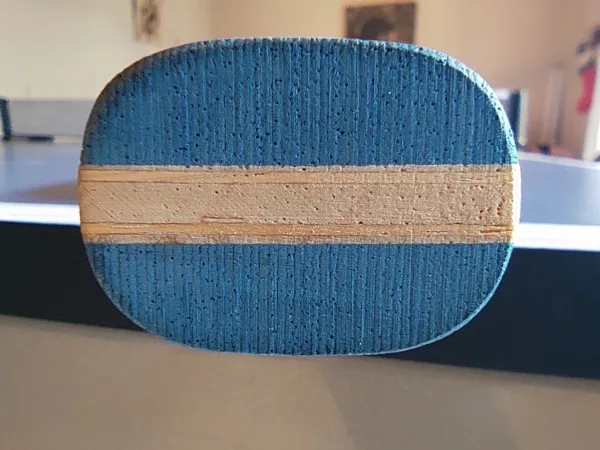 A picture of a Limba-ayous composition on my personal blade, the Stratus Power Wood. 