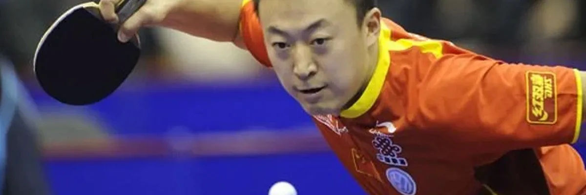 Ma Lin preparing a forehand loop with his penhold grip