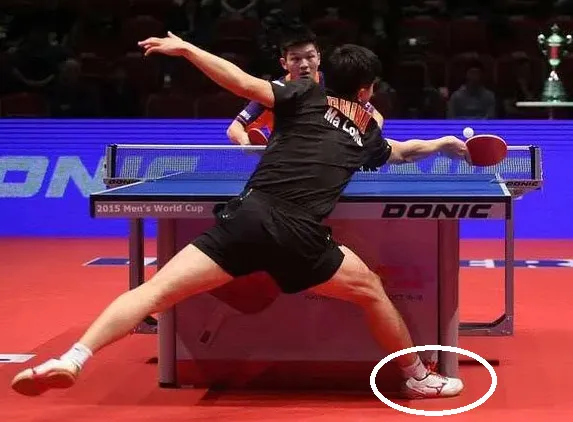 Ma Long Wearing Mizuno Wave Drive