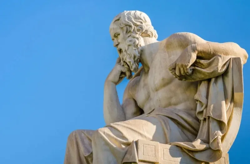 A picture of a Socrates statue