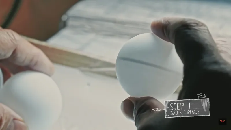 A picture of a Table Tennis Ball with an uneven seam