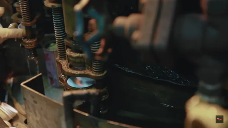 A picture of the machine to shape the halves.