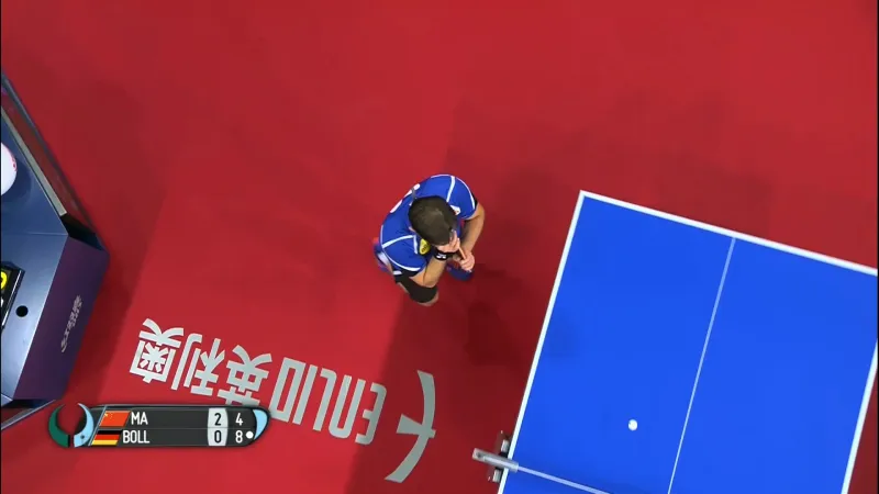 A picture of Timo Boll Cleaning His Racket.