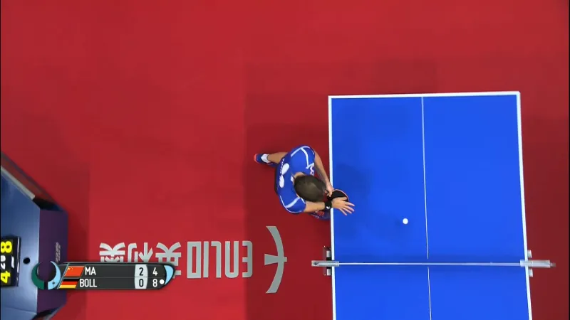 A picture of Timo Boll Cleaning His Racket.