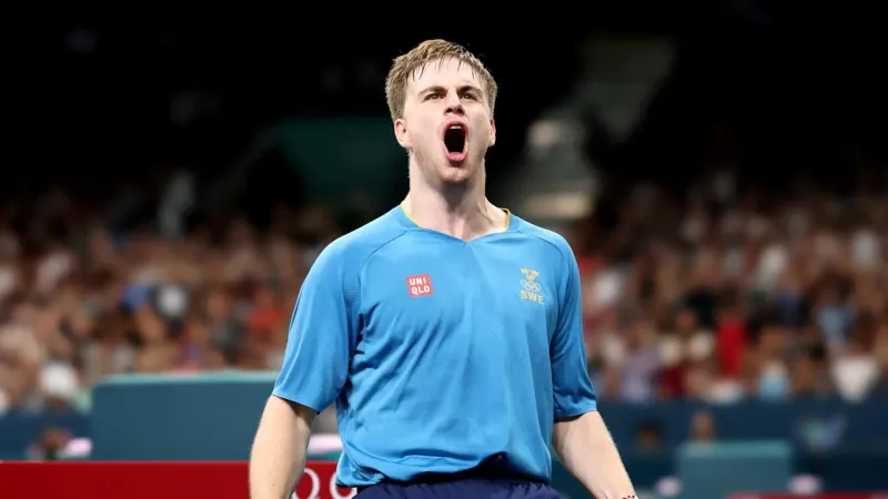 Truls Moregard celebrating beating Wang Chuqin