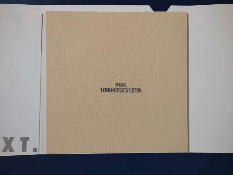 Reverse side of the Victas V22 Double Extra table tennis rubber showing the beige open-cell sponge and batch number