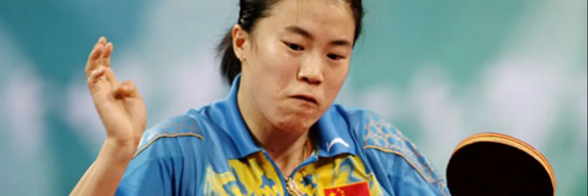 Wang Nan loading up a backhand loop at the Olympic Games